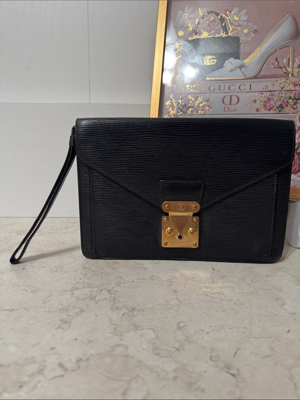 Authentic Louis Vuitton Black Epi Leather Wristlet with Gold S Lock